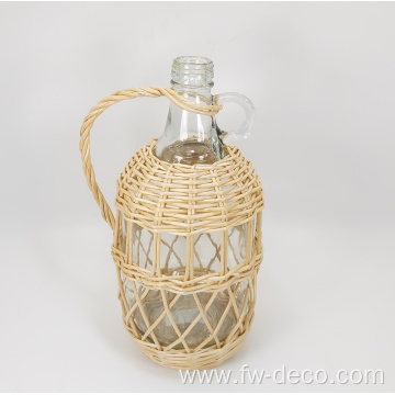 large ratten wrapped clear glass bottles with handle